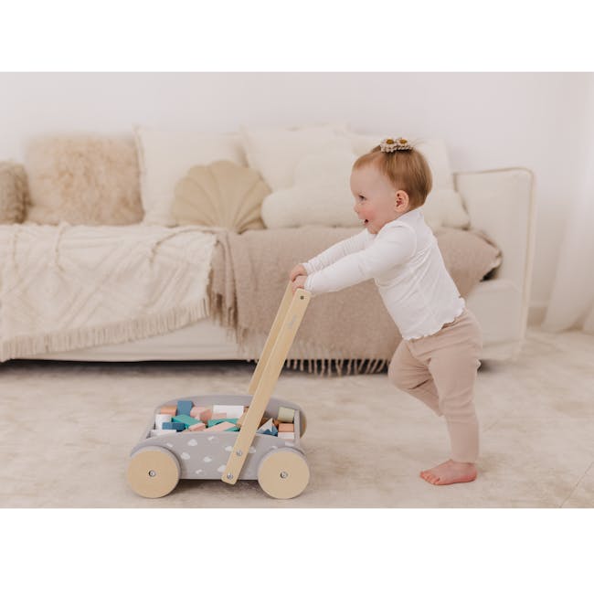 Bubble Wooden Baby Push Cart with 45 Buiding Blocks - 6 - Baby in white shirt and beige pants, standing on beige carpet