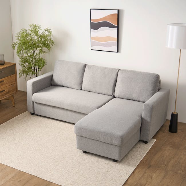 Mia L-Shaped Storage Sofa Bed -  Graphite - 2 - Modern living room, minimalist design, light gray sofa, wooden floor, beige