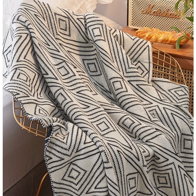 Allen Throw Blanket - 6 - Patterned blanket, geometric design, black and white, modern style, cozy setting, woven chair