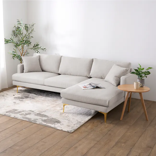 Declan L-Shaped Sofa - Oak, Ivory - 16 - Light gray sofa, wooden legs, light beige cushions, modern design, cozy atmosphere