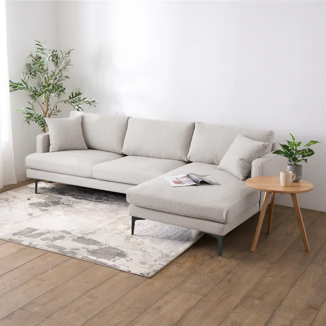 Declan L-Shaped Sofa - Oak, Ivory - 31 - Light gray sofa, minimalist decor, wooden floor, natural light, modern design, cozy