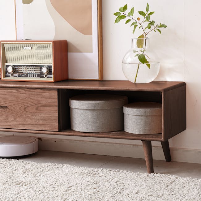 Beau TV Console 2m - Walnut - 4 - Vintage radio on wooden cabinet, round storage bins, modern robotic vacuum cleaner, white