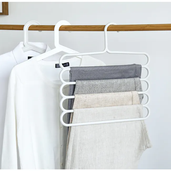 Multi Hanger - White - 2 - White hangers, neatly folded clothes, minimalist wardrobe, clothes drying rack, white shirt, gray