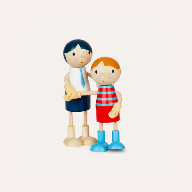 Tender Leaf Doll House - Doll Family - 3 - Wooden figures, cartoonish characters, standing side by side, smiling faces, blue