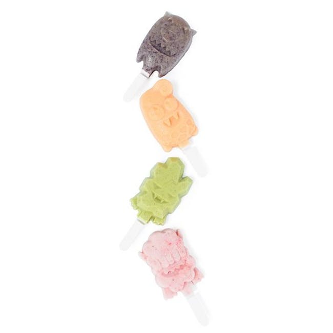 Zoku Monster Ice Pop Mold - 4 - Colorful, playful ice cream popsicles in shades of purple, orange, green, and pink.