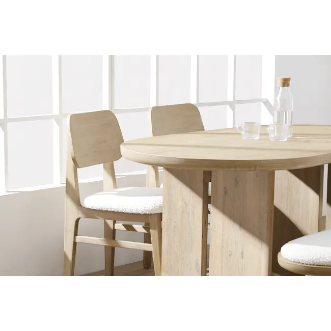 Catania Dining Table 1.8m with 4 Catania Dining Chairs - 2 - Light wood dining table, minimalist chairs, natural sunlight