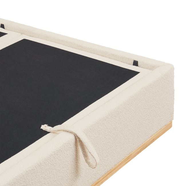 Nova King Storage Bed in Beige Boucle with 2 Natalia Bedside Table - 14 - Cream-colored carpet with black border, light