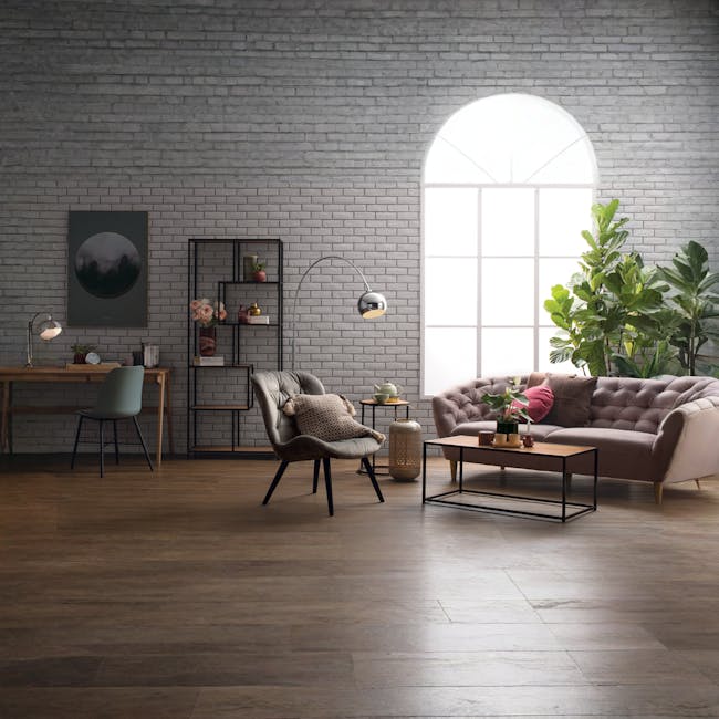Daniela Coffee Table - 2 - Modern minimalist living room, cozy seating area, gray brick wall, wooden floor, contemporary