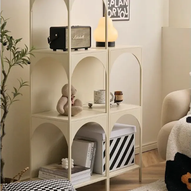 Novi Arch 3-Tier Storage Shelf - Cream - 5 - Vintage radio on top shelf, surrounded by soft cushions, Teddy bear sits on the