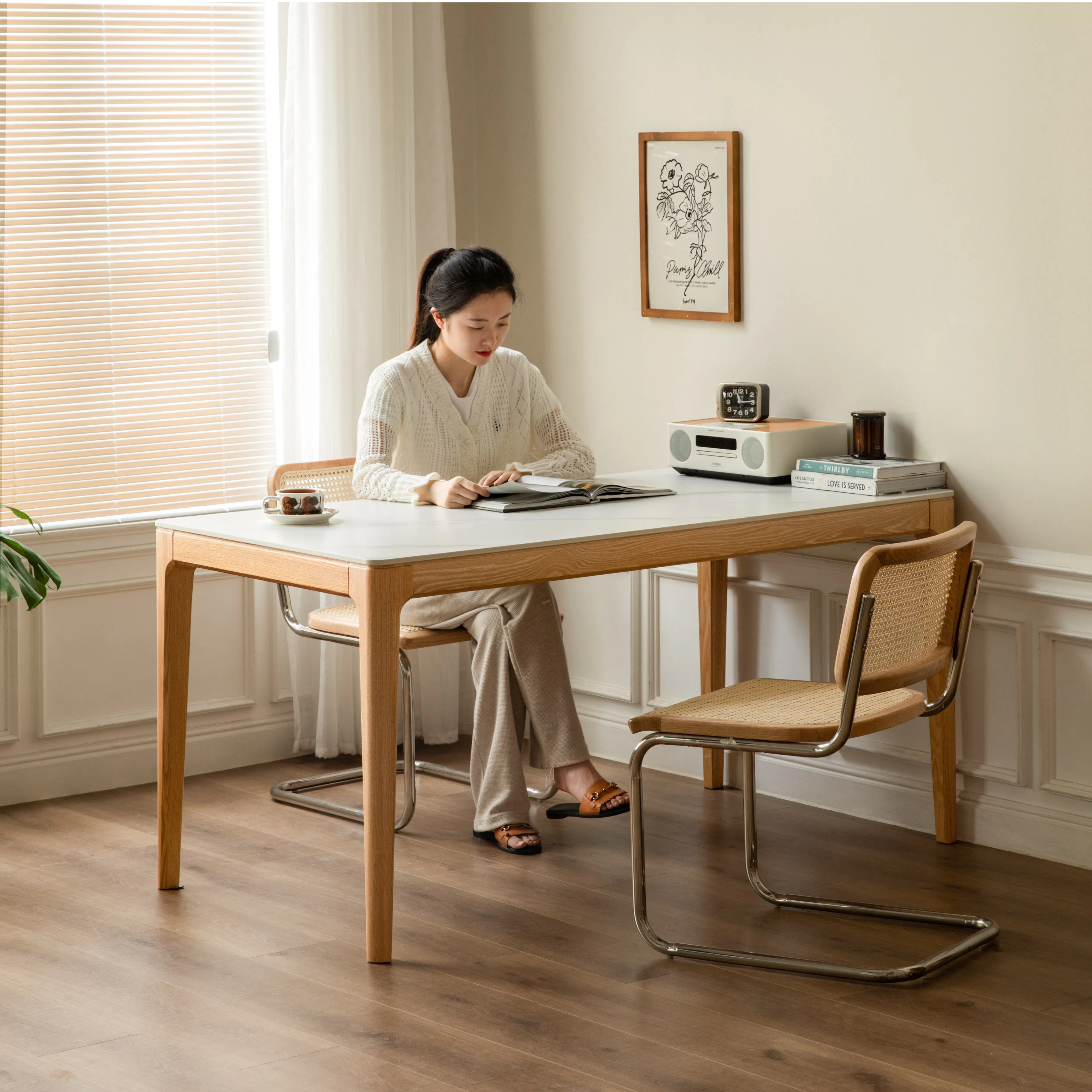 Adelyn Dining Table 1.4m (Sintered Stone) with 2 Niel Chairs and Niel Bench 1.25m in Oak - 17 - Sunlit room, woman reading