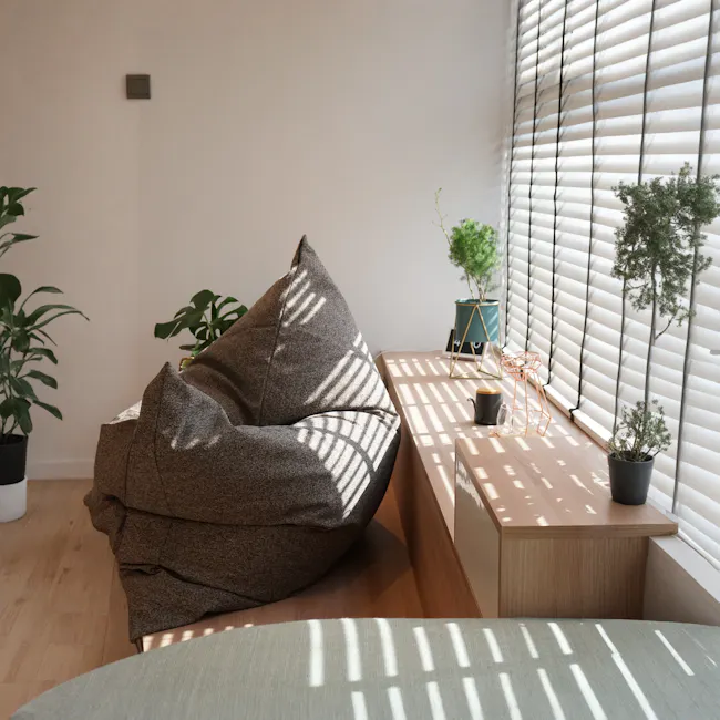 SoftRock Vesuvius Linen Rectangle Bean Bag - Osbourne - 3 - Sunlit sofa, green plant, wooden table, geometric vase, black