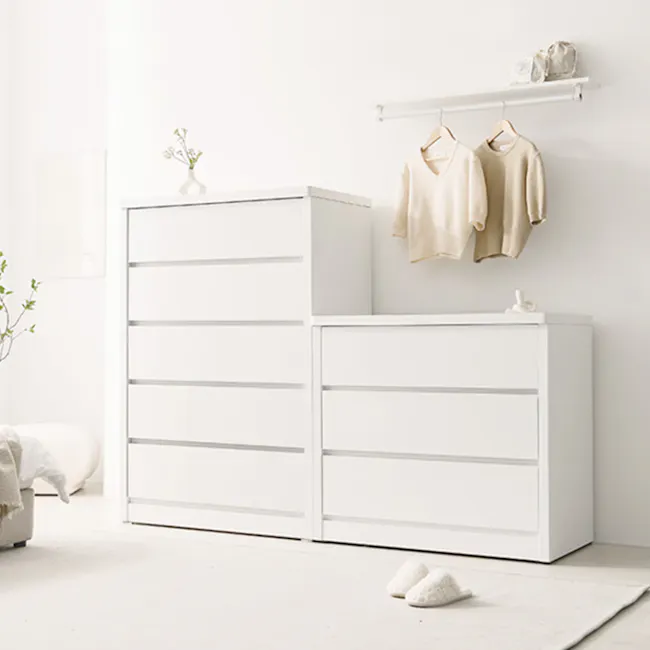 Kye 5 Drawer Chest 0.8m - White - 2 - White minimalist dresser, beige V-neck sweater, white shelf, small vase with flowers