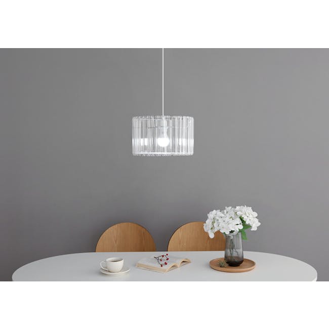 Acril Lampshade - 2 - Clear modern pendant light, minimalist dining room, white round table, wooden chairs, soft gray