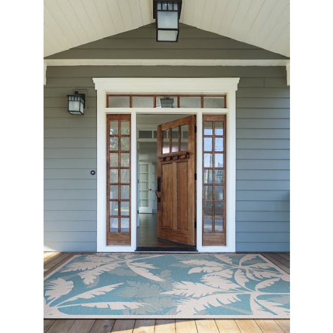 Coastal Flora Flatwoven Rug - Ivory Turquoise (3 Sizes) - 2 - Wooden double doors, glass panels, white trim, gray siding