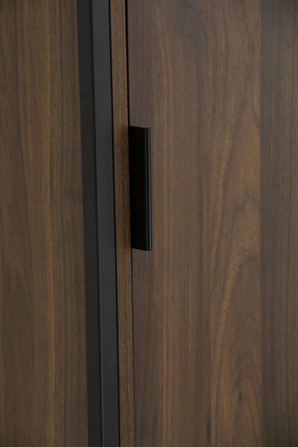 Capri Wardrobe Shelf Cabinet - 14 - Wooden door, black handle, vertical wood grain, polished finish, natural wood texture