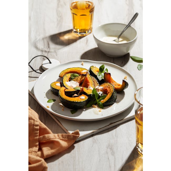 Luzerne Ripple 11cm Dish - White Dew - 2 - Golden roasted squash slices on white plate, garnished with fresh basil leaves