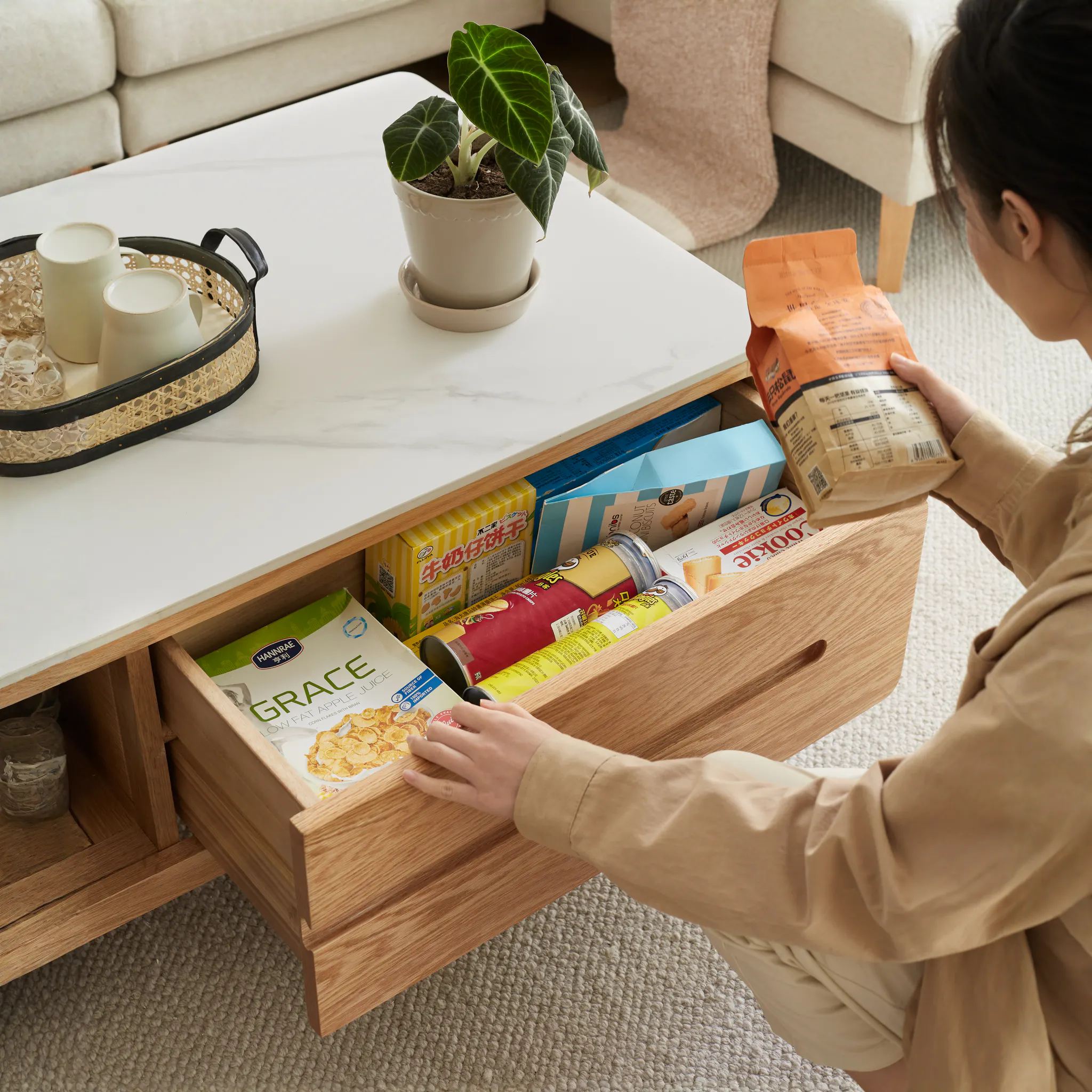 Devin Coffee Table 1m (Sintered Stone) - 14 - Wooden drawer, beige fabric, person's arm, beige pants, kitchen countertop