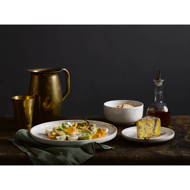 Luzerne Marble Round Coupe Plate (3 Sizes) - 4 - Golden metal pitcher, white marble bowl, rustic wooden table, dark