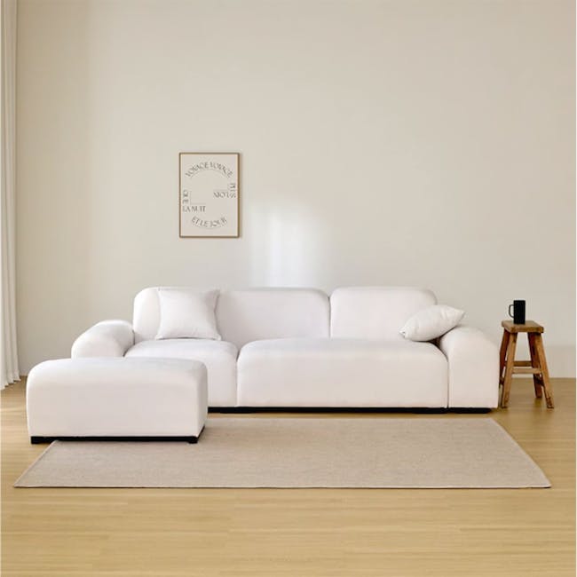 Sono 4 Seater Chaise Sofa - Ivory (Pet Friendly) - 14 - White modern sofa, minimalist decor, light beige rug, wooden stool