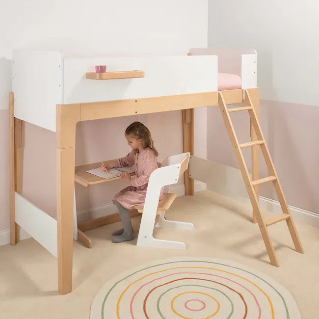 Natty Boori Single Loft Bed - Blueberry & Almond - 3 - Wooden bunk bed with white frame, child sitting at desk, pink cushion