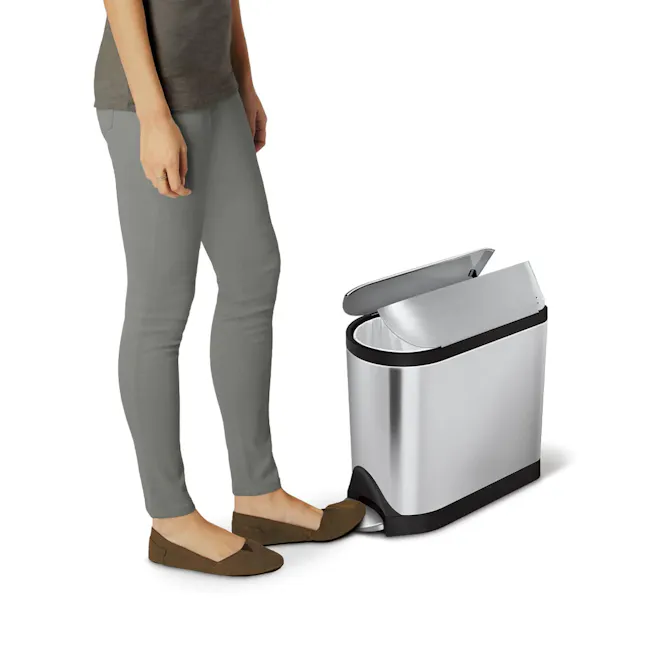 simplehuman Butterfly Step Bin - Brushed (2 Sizes) - 7 - gray pants, modern kitchen, smart trash can, person standing, brown