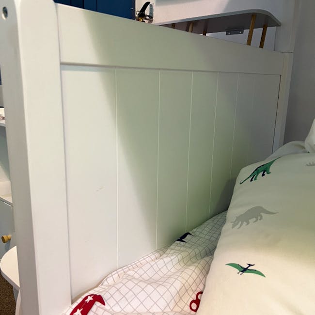 Matt Super Single Bunk Bed with Staircase - 5 - White wooden bed frame, green dinosaur print, white duvet cover, red and