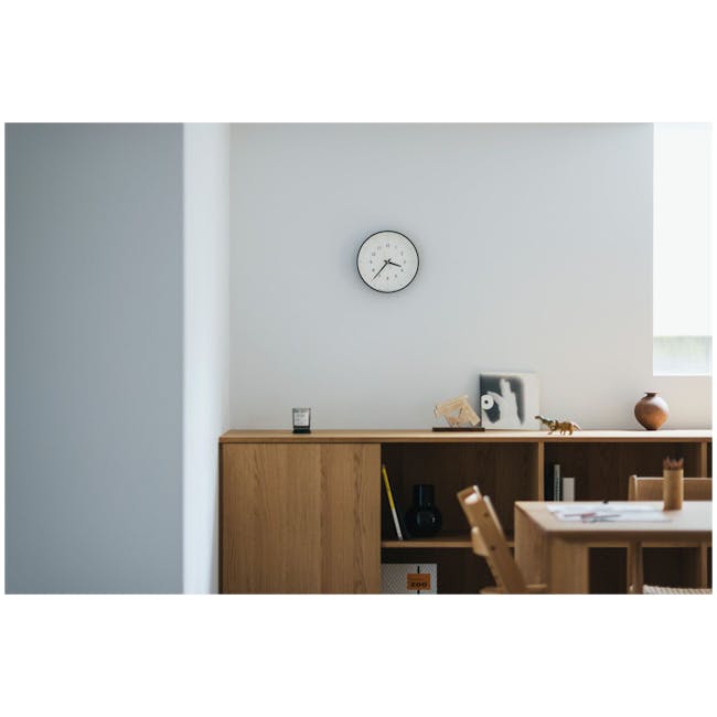 Essent Clock -White - 6 - Minimalist room, modern decor, white walls, wooden furniture, clock on wall, minimalist design