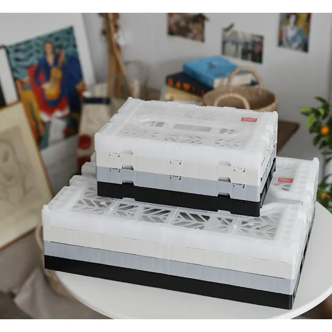 Aykasa Foldable Midibox - White - 6 - White plastic storage bins, stacked on a table, gray and black plastic trays, colorful