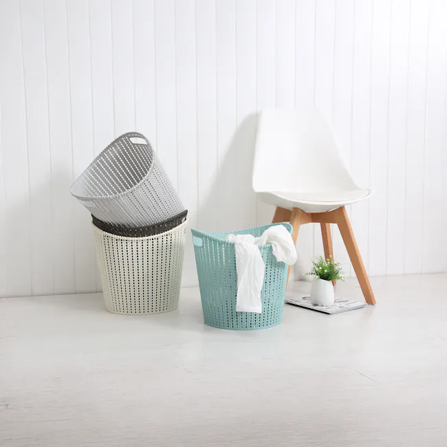 Alice Laundry Basket - Grey - 6 - White laundry basket, white chair, light wooden floor, white potted plant, newspaper