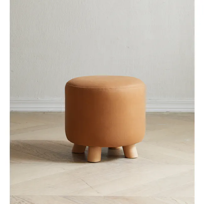 Niyo Stool - Tan - 12 - Round, brown, cushioned stool, minimalist design, wooden legs, light wood floor, simple decor, cozy
