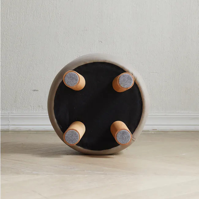 Niyo Stool - Tan - 13 - Round ottoman with four cylindrical wooden handles, beige cushioned interior, black fabric exterior