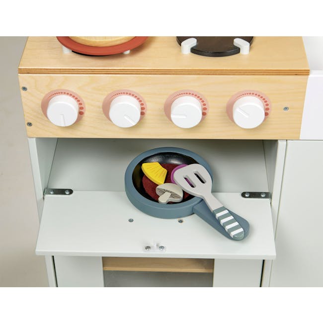 Tender Leaf Toy Kitchen - La Fiamma Grand Kitchen - 7 - Wooden stove with four control knobs, white stove top, blue frying