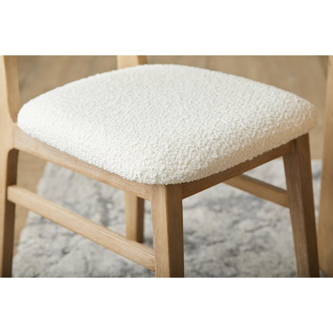 Catania Dining Chair - 7 - Wooden chair with white cushion, natural wood finish, sturdy construction, minimalist design