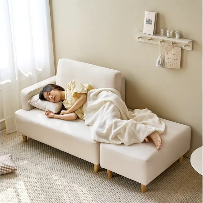 Genevieve 2 Seater Chaise Sofa with Ottoman - Ivory (Pet Friendly) - 5 - Sunlit room, cozy sofa, woman sleeping, light