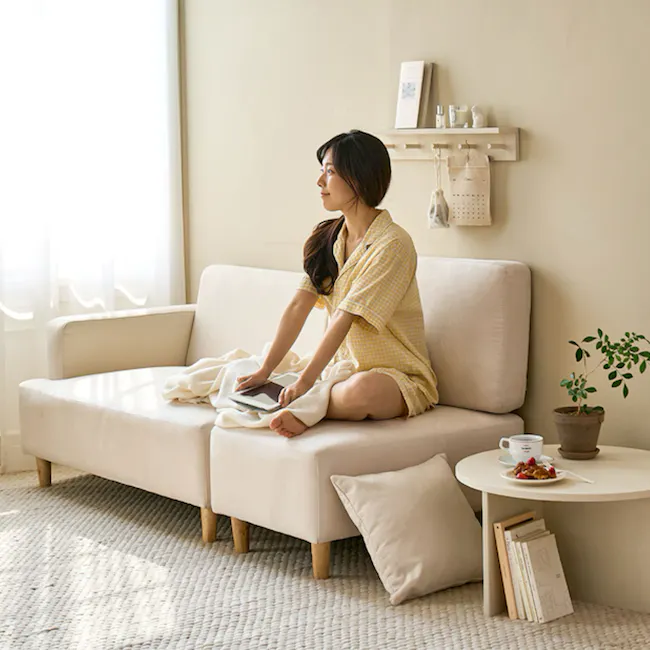 Genevieve 2 Seater Chaise Sofa with Ottoman - Ivory (Pet Friendly) - 6 - Yoga mat, bookshelf, potted plant, cozy sofa, soft
