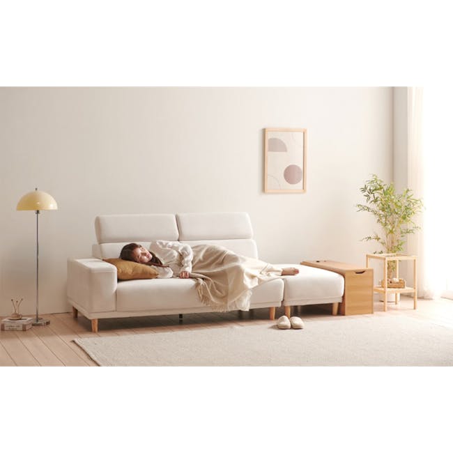 Melysa 3 Seater Left Arm Chaise Sofa with Adjustable Headrest - Ivory (Eco Clean Fabric) - 15 - White sofa, woman sleeping