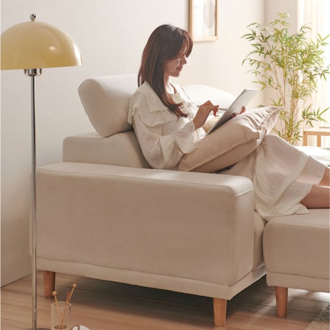 Melysa 3 Seater Left Arm Chaise Sofa with Adjustable Headrest - Ivory (Eco Clean Fabric) - 21 - Luxurious beige sofa, woman