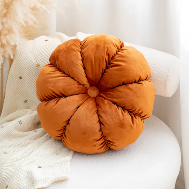 Velvet Petal Round Cushion - Rust - 3 - Creamy white knitted throw, fluffy white pillow, cozy armchair, soft plush orange