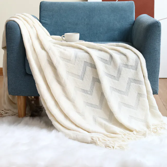 Hikari Chevron Knitted Throw - Off White - 2 - blue armchair, white and beige chevron-patterned blanket, cozy indoor