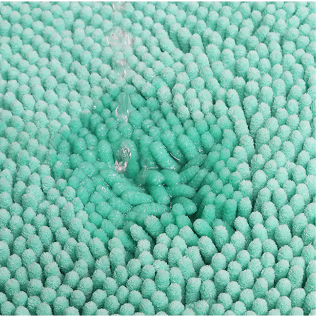 Cora Chenille Bath Mat - Mint Green - 4 - Teal-colored, textured fabric with a water splash, Close-up view of a soft
