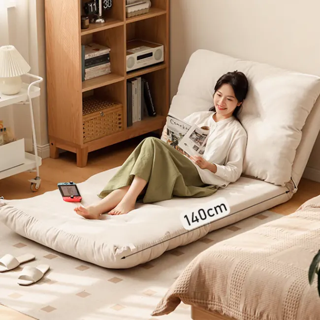 Jesse Sofa Bed - Cream Corduroy - 3 - Luxurious bed with 140cm mattress, cozy woman reading magazine, comfortable mattress