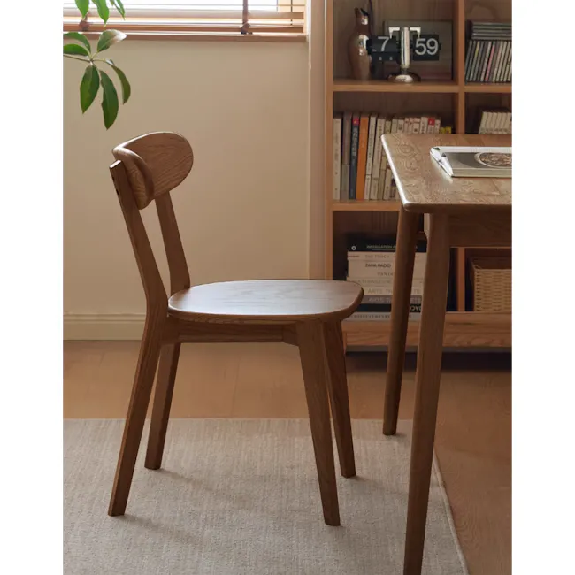 Blane Chair - Walnut - 5 - Wooden chair, minimalist design, natural wood finish, simple structure, cozy room, soft lighting
