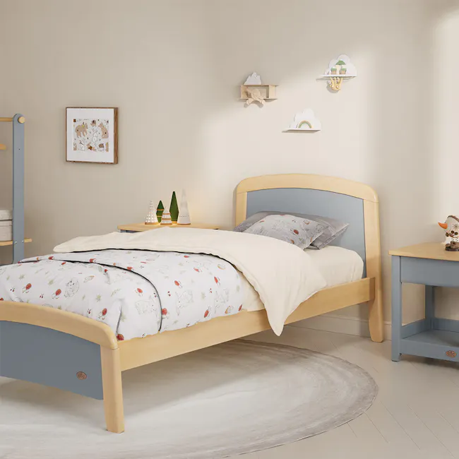 Bronte Single Bed - Blueberry & Almond - 8 - Wooden bed with light blue headboard, white and colorful bedding, small animal