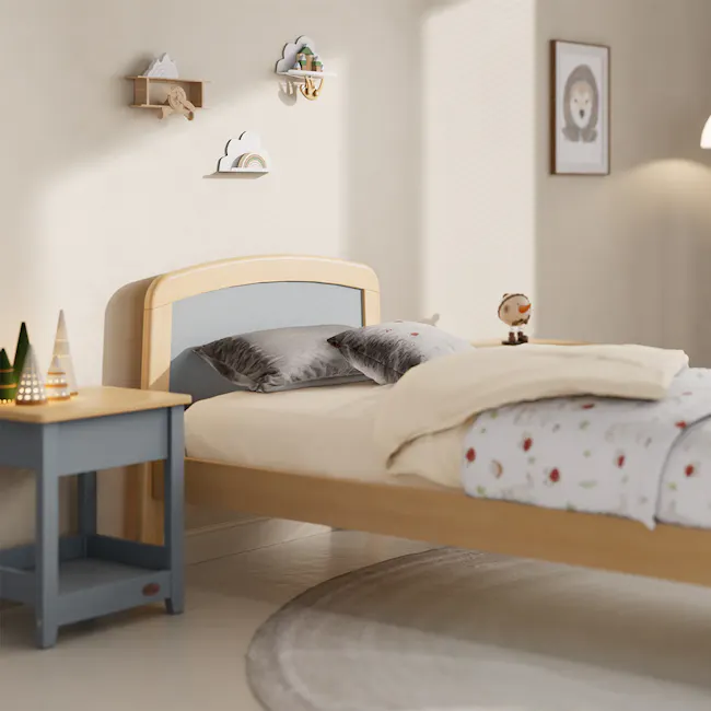 Bronte Single Bed - Blueberry & Almond - 4 - Wooden bed with gray and white pillows, small owl figurine on top, light blue