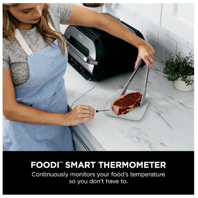 Ninja Foodi Smart XL Grill & Air Fryer - 5 - woman cooking, stainless steel appliance, smart thermometer, food temperature