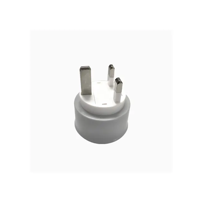 SOUNDTEOH Universal Travel Adaptor - 3 - White power adapter, metallic prongs, flat design, circular base, two prongs, three