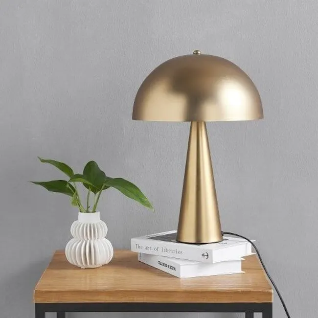 Cohen Table Lamp - Brass - 3 - Gold desk lamp, minimalist design, modern decor, white vase, green plant, wooden table, sleek