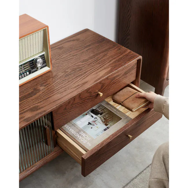 Lucia TV Console 1.5m - 4 - Vintage radio on wooden side table, brown wooden drawer, leather wallet inside drawer, person's