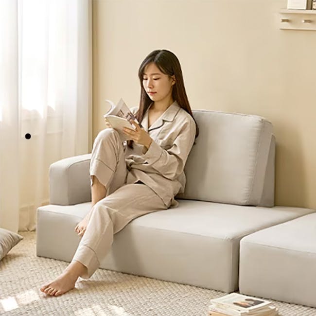 Genevieve 2 Seater Chaise Sofa with Ottoman - Grey (Pet Friendly) - 7 - Light beige, cozy living room, woman reading