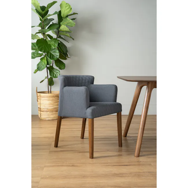 Rhoda Armchair - Cocoa, Hale - 2 - Grey upholstered armchair, wooden legs, natural wood table, light wooden floor, potted